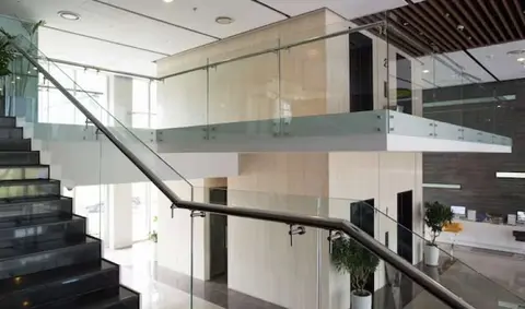 Glass railing on an interior staircase